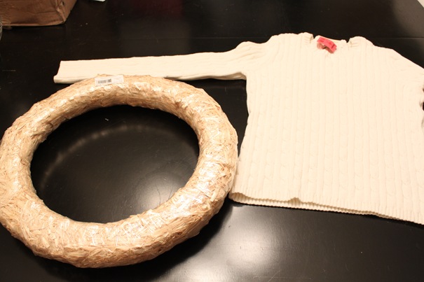 straw wreath and sweater