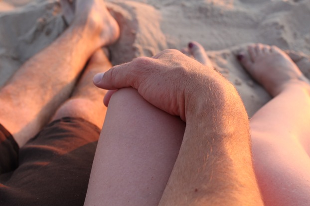 holding hands beach